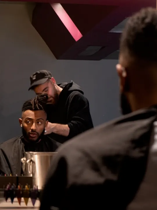 Barbers at work in the shop
